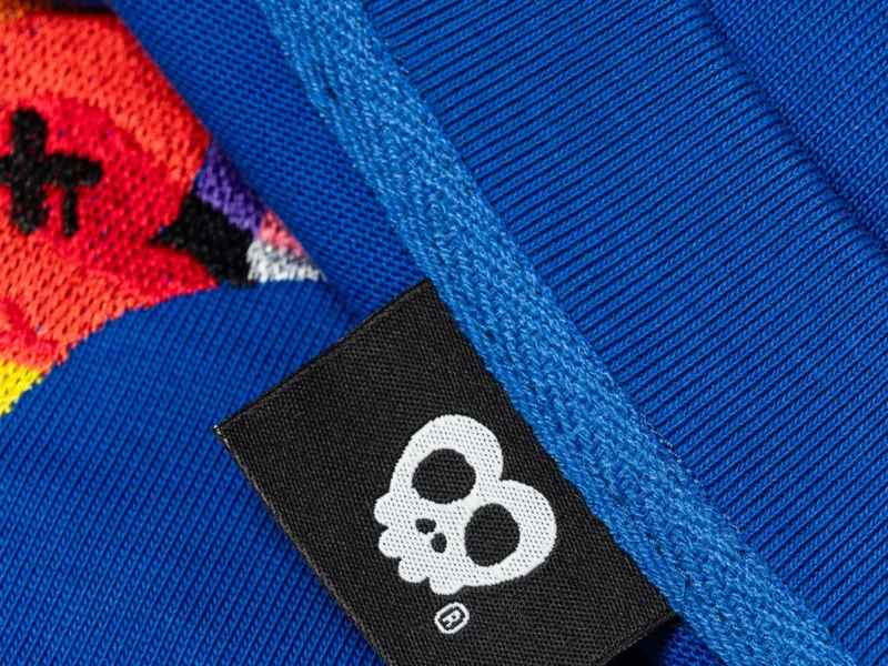Detail of ilakh label sewn onto T-shirt - Ilakh